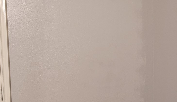 Bathroom Wall Patched And Repainted