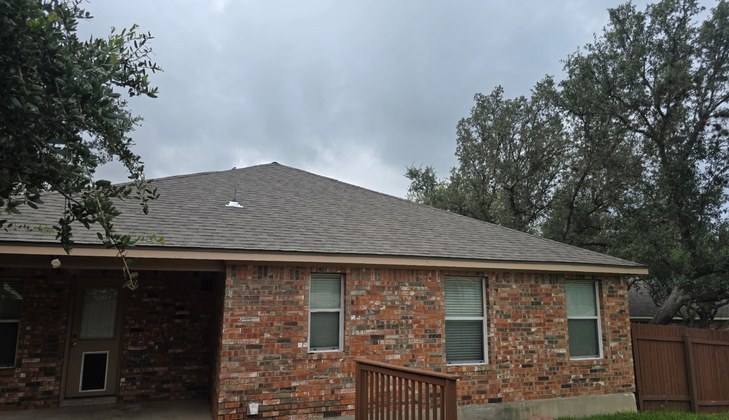 Rear Of Home With New Roof Shingles